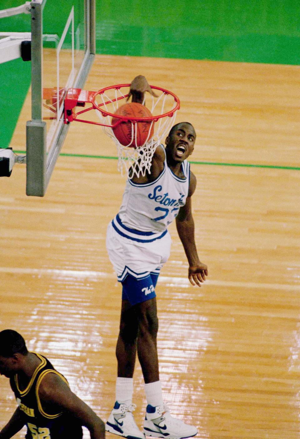 Seton Hall's John Morton slamming home two of his 35 points in a losing effort  to Michigan in the 1989 NCAA championship game in Seattle's Kingdome,