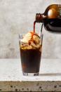 <p>Pour cold brew coffee over ice. Top with 1 scoop dulce de leche ice cream.</p><p><strong>RELATED: </strong><a href="https://www.goodhousekeeping.com/food-products/g32403995/best-instant-coffee/" rel="nofollow noopener" target="_blank" data-ylk="slk:The Best Instant Coffees Make On-The-Go Sipping so Much Better;elm:context_link;itc:0;sec:content-canvas" class="link ">The Best Instant Coffees Make On-The-Go Sipping so Much Better</a></p>