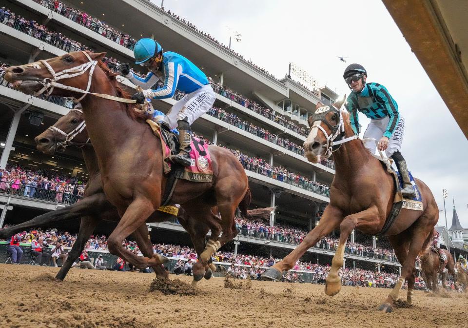 Mage, left, with jockey Javier Castellano, wins the 149th running of the Kentucky Derby on Saturday at Churchill Downs.