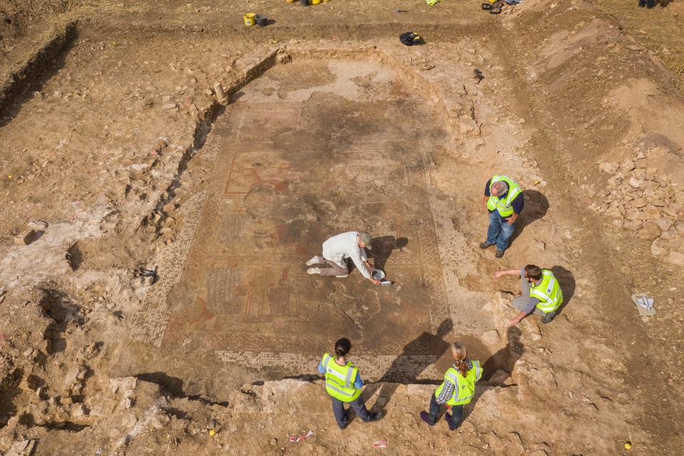 Drone photography, aerial view of the Historic England staff with team members from ULAS/University of Leicester during the excavations of a large Roman mosaic.