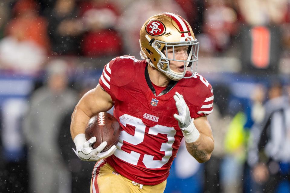 January 20, 2024; Santa Clara, CA, USA; San Francisco 49ers running back Christian McCaffrey (23) runs the ball against the Green Bay Packers during the first quarter in a 2024 NFC divisional round game at Levi's Stadium. Mandatory Credit: Kyle Terada-USA TODAY Sports