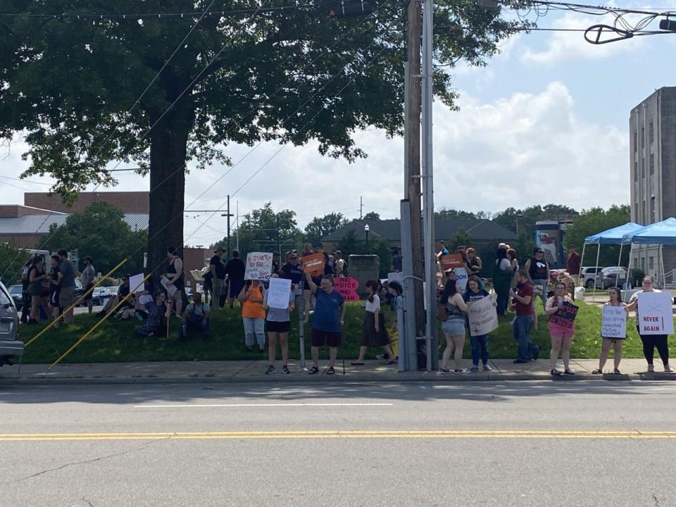 People gather in front of the Sebastian County Courthouse to demonstrate for abortions.