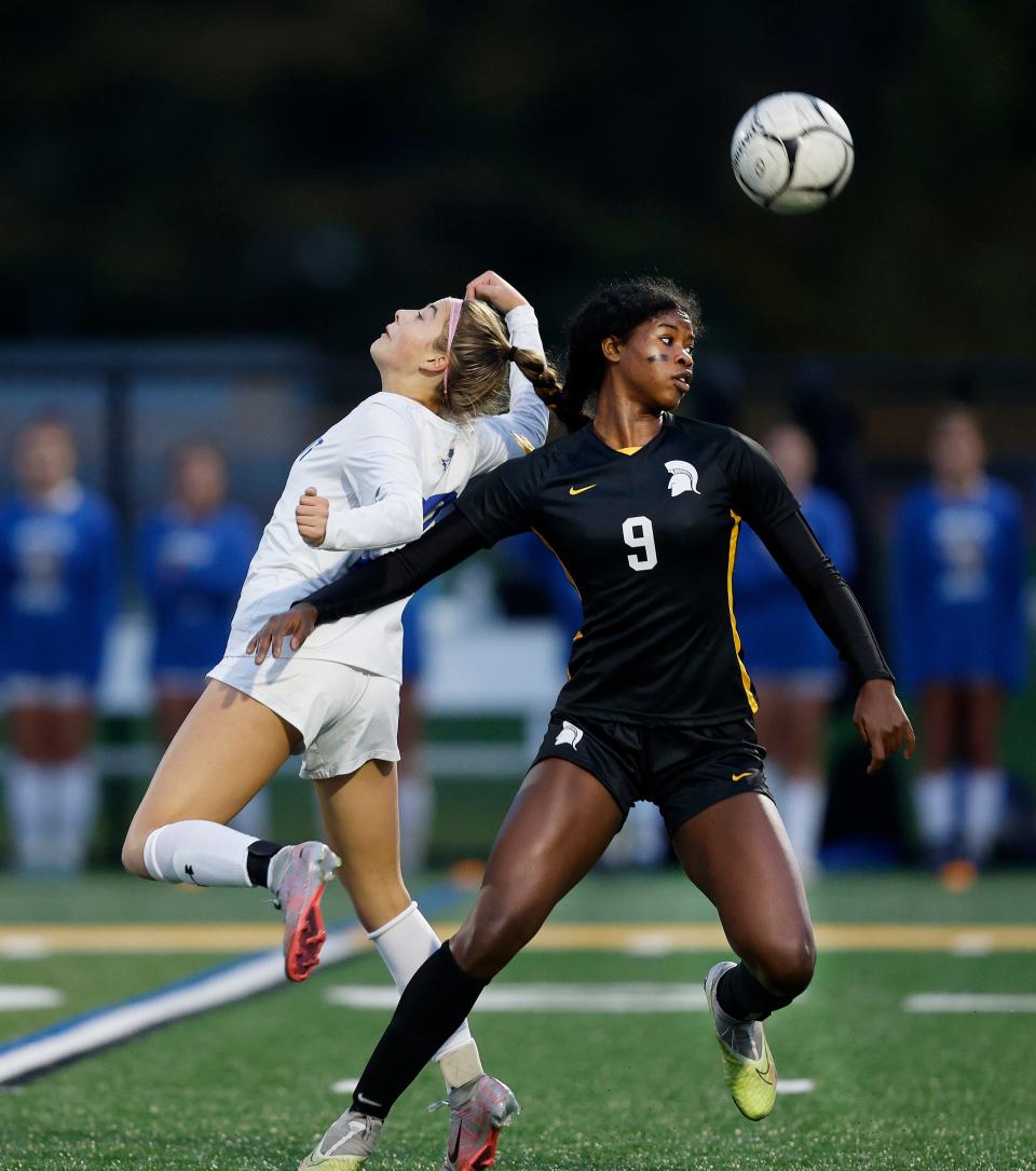 Greece Athena’s Wrianna Hudson tries to control the ball against Irondequoit.