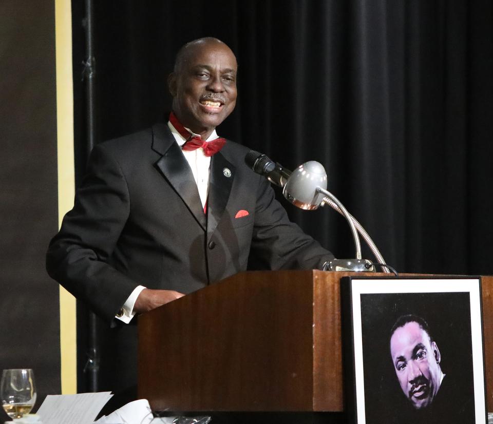 Rodney Long, the founder and president of the MLK Commission of Florida, smiles as he recognizes his wife Carol during the 37th Annual Martin Luther King, Jr. Hall of Fame Award Banquet, at the Best Western Gateway Grand in Gainesville Jan. 9, 2022.