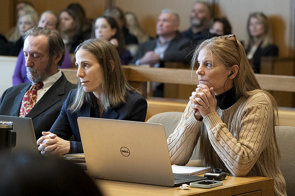 Michelle Troconis listens to arguments at the start of her trial, Thursday, Jan. 11, 2024, in Stamford, Conn. The trial of Troconis, charged in the 2019 killing of mother-of-five Jennifer Dulos, has begun in Stamford Superior Court with a six-person jury hearing the case.(Richard Harbus/Dailly Mail via AP, Pool)