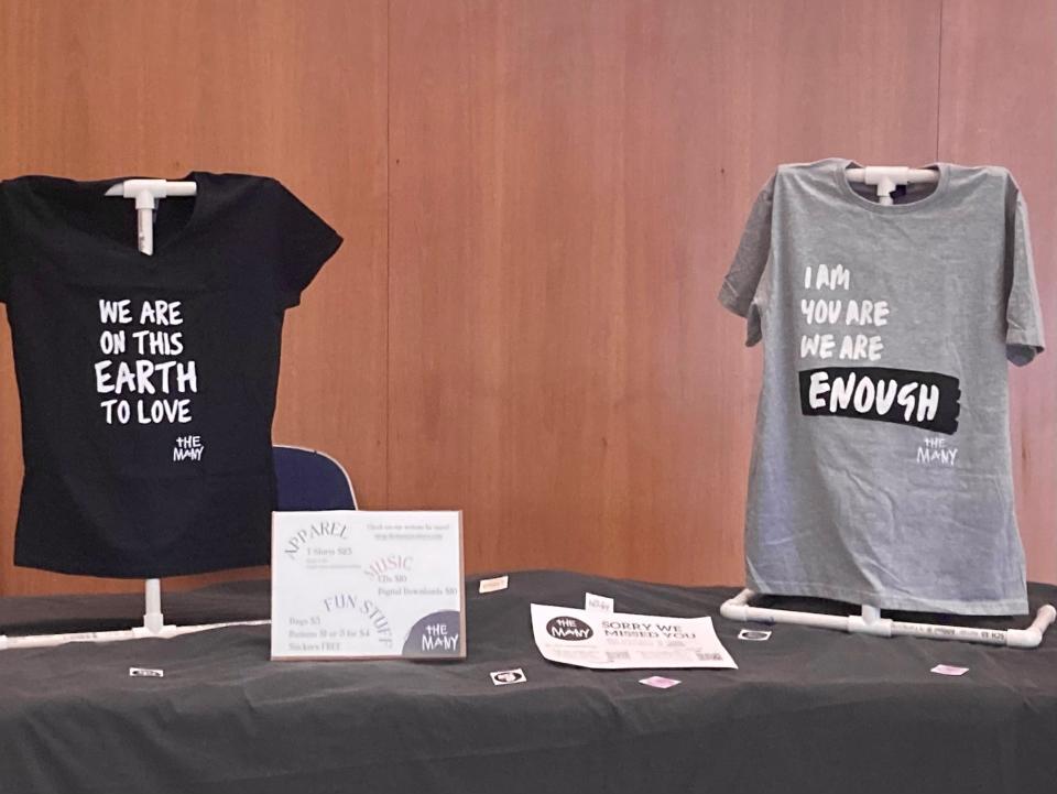 Shirts for sale in the lobby outside the United Methodist Churches of Indiana annual conference at Emens Auditorium at the Ball State University campus.