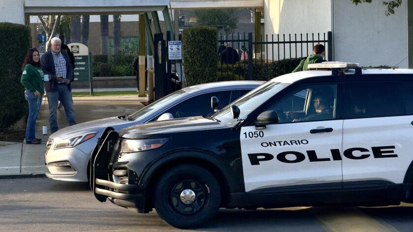 ONTARIO CA FEBRUARY 15, 2024 - Ontario Police keep a presence outside Ontario Christian Hight School on Thursday,Feb. 15, 2024, where a student was arrested over the weekend is facing multiple felony charges after an investigation revealed an alleged plan to "carry out an active shooter attack" at the school. (Irfan Khan / Los Angeles Times)