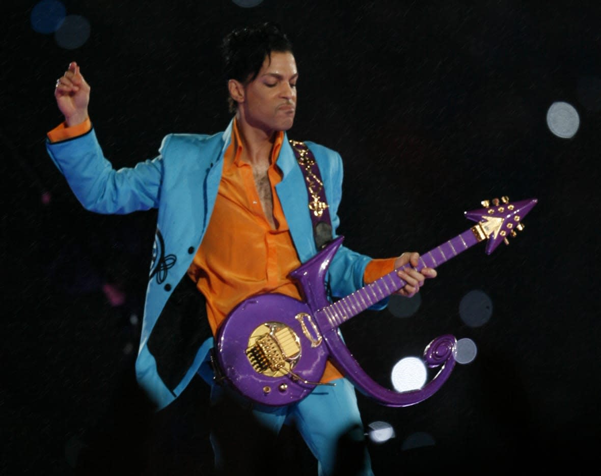 Prince performs during the halftime show of Super Bowl XLI on Feb. 4, 2007, in Miami. (Photo by Jack Gruber/USA Today Network)