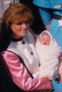 <p>A newborn Princess Eugenie naps while her mother Sarah, the Duchess of York, cradles her outside the hospital in London. In 2017, Eugenie told <em><a href="https://www.harpersbazaar.com/culture/features/a16956/princess-eugenie-of-york-interview/" rel="nofollow noopener" target="_blank" data-ylk="slk:Harper's Bazaar;elm:context_link;itc:0" class="link ">Harper's Bazaar</a></em>, "What can't I live without? My family. That sounds cheesy, but I really can't. Especially my mum. I wouldn't be able to make tough decisions without her. And my sister. My mum always says that we're the only ones who know exactly what's going on in each other's lives."</p>