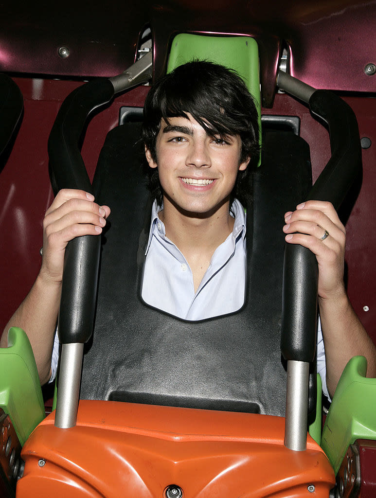 riding a rollercoaster with long bangs