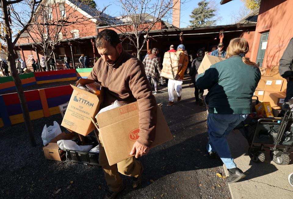 Mosaic Inter-Faith Ministries hands out Thanksgiving meals in Salt Lake City on Tuesday, Nov. 21, 2023. | Jeffrey D. Allred, Deseret News