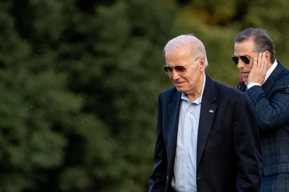 President Joe Biden and his son Hunter Biden arrive at Fort McNair, Sunday, June 25, 2023, in Washington. The Bidens are returning from Camp David.