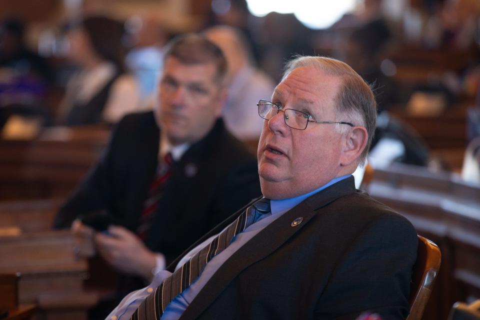 House Speaker Rep. Dan Hawkins, R-Wichita, watches as votes come in on overriding the governor's veto on a bill banning transgender athletes in women's sports.