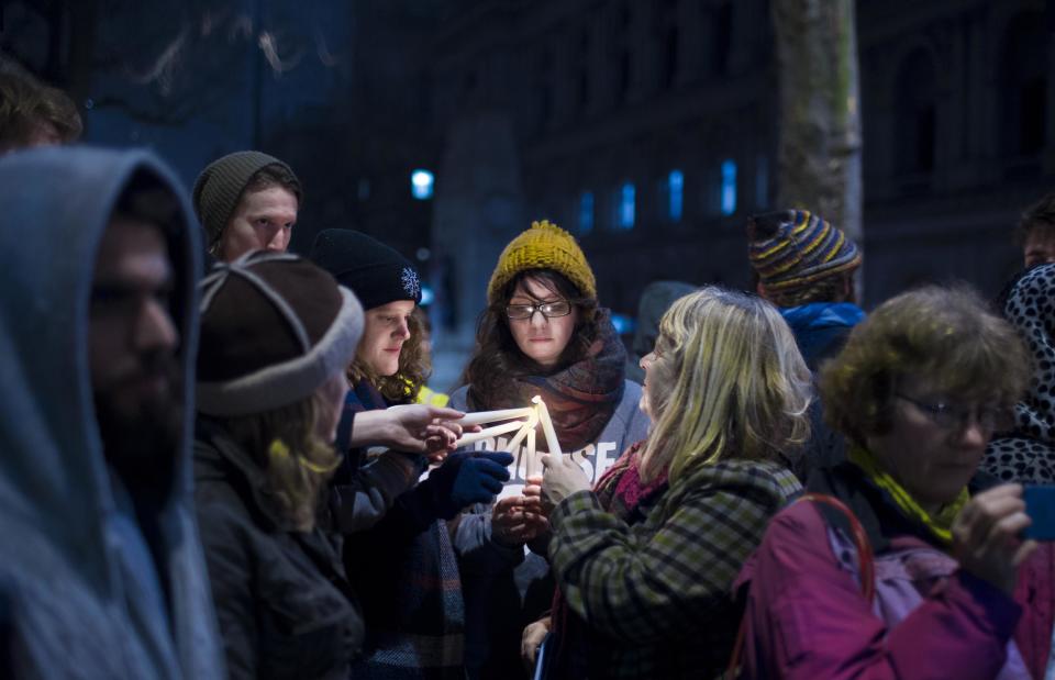 Dozens of people attended the 'solidarity sleep-out' outside Downing Street on Wednesday night to speak out for homeless child refugees in France (Tam)