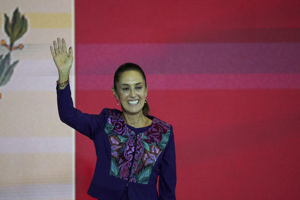 Ruling party presidential candidate Claudia Sheinbaum addresses supporters after the National Electoral Institute announced she held an irreversible lead in the race in Mexico City, early Monday, June 3, 2024. (AP Photo/Fernando Llano)