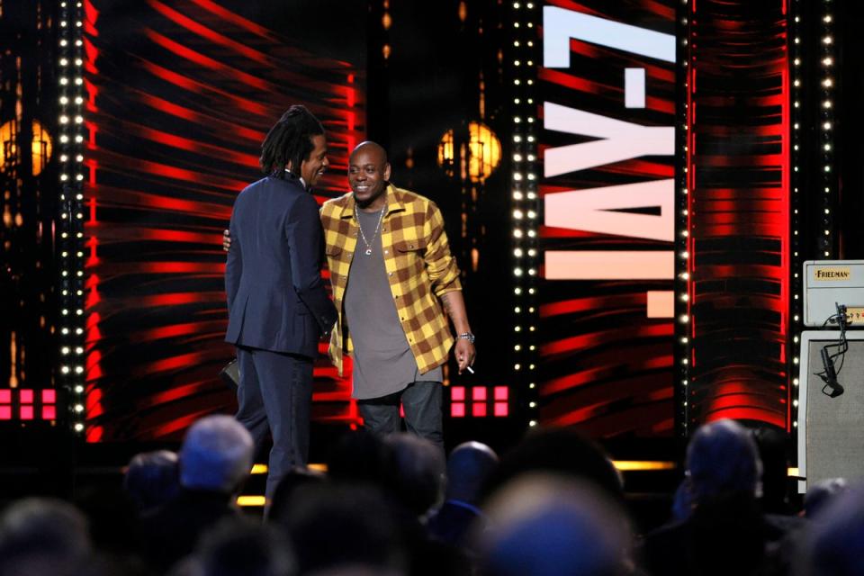 Chappelle (R) inducts West’s former pal Jay-Z into the 36th Annual Rock & Roll Hall Of Fame Induction last year (Getty Images)