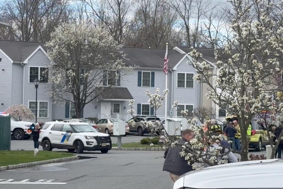 Firefighters and residents on the streets in Lebanon, NJ. Robert Miller for NY Post