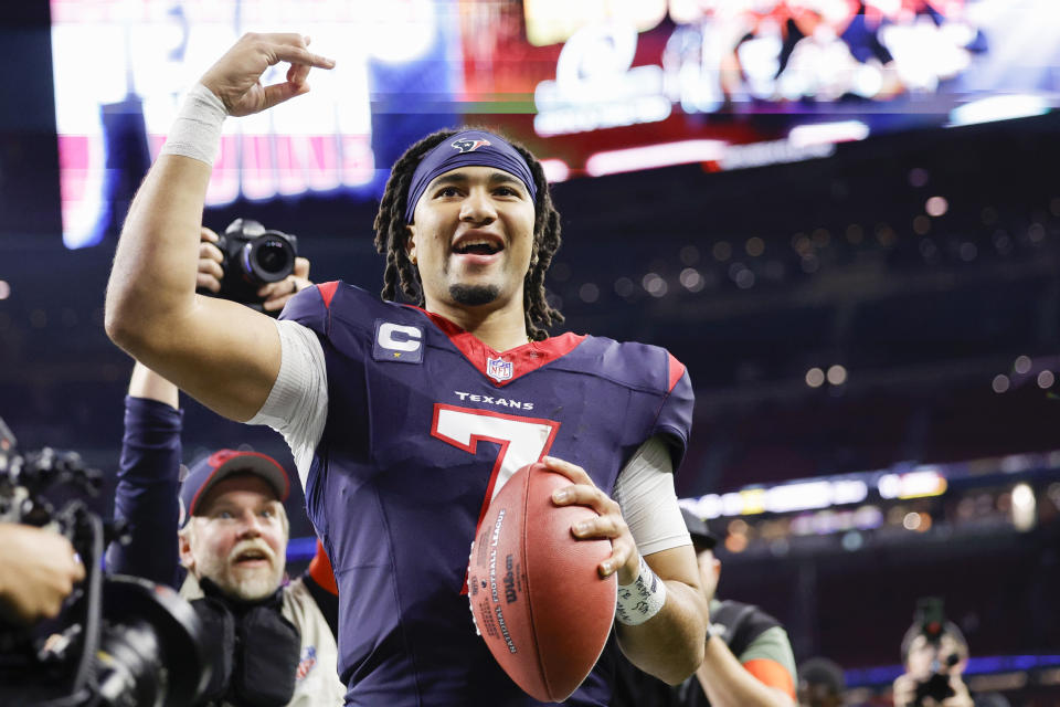 HOUSTON, TEXAS - JANUARY 13: C.J. Stroud #7 of the Houston Texans celebrates after defeating the Cleveland Browns in the AFC Wild Card Playoffs at NRG Stadium on January 13, 2024 in Houston, Texas. (Photo by Carmen Mandato/Getty Images)