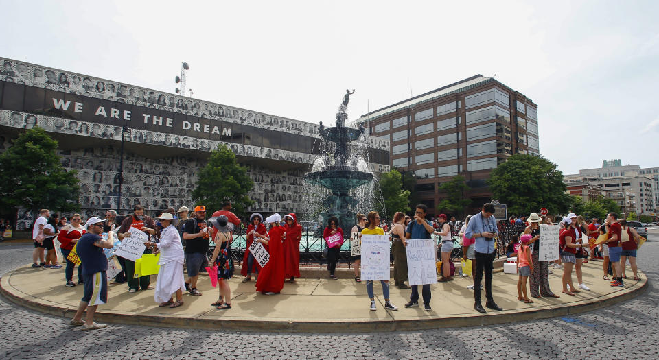 Protesters for women's rights gather to march to the Alabama Capitol to protest a law passed last week making abortion a felony in nearly all cases with no exceptions for cases of rape or incest, Sunday, May 19, 2019, in Montgomery, Ala. (AP Photo/Butch Dill)