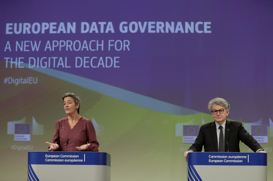 European Commissioner for Europe fit for the Digital Age Margrethe Vestager, left, and European Commissioner for Internal Market Thierry Breton participate in a media conference on European Data Governance at EU headquarters in Brussels, Wednesday, Nov. 25, 2020. (Stephanie Lecocq, Pool via AP)