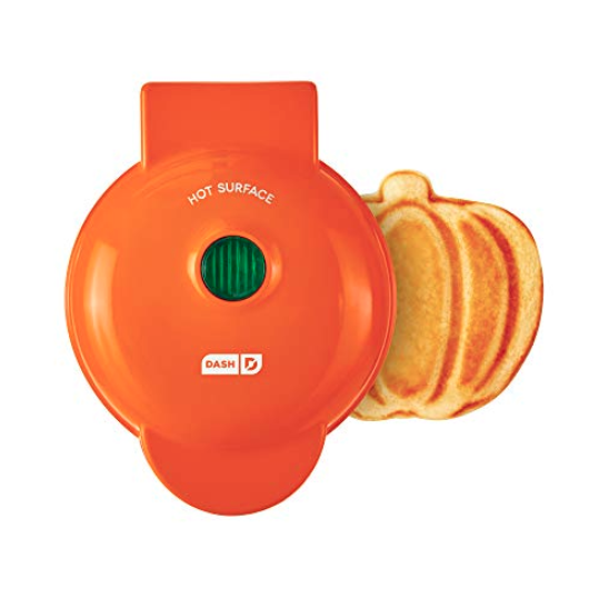 <p><strong>DASH</strong></p><p>amazon.com</p><p><strong>$12.99</strong></p><p>DASH makes these mini waffle makers for just about every holiday and we're obsessed with all of them. How could we resist this cute pumpkin? Pair it with some <a href="https://www.amazon.com/Birch-Benders-Pancake-Waffle-Pumpkin/dp/B075K1H28L/?tag=syn-yahoo-20&ascsubtag=%5Bartid%7C10050.g.36957166%5Bsrc%7Cyahoo-us" rel="nofollow noopener" target="_blank" data-ylk="slk:pumpkin spice pancake mix" class="link ">pumpkin spice pancake mix </a>for an extra-special gift. </p>