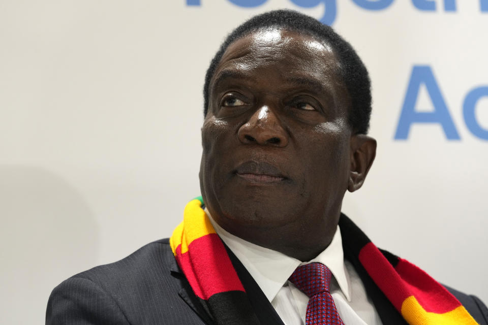 FILE - President Emmerson Mnangagwa, of Zimbabwe, attends a session at the Africa Pavilion at the COP27 U.N. Climate Summit, Nov. 7, 2022, in Sharm el-Sheikh, Egypt. In a national address that he delivered in November in a new Chinese-gifted multimillion-dollar parliament building, Mnangagwa held out the invitation to the U.S.-Africa summit as a sign of his administration's success. (AP Photo/Peter Dejong, File)