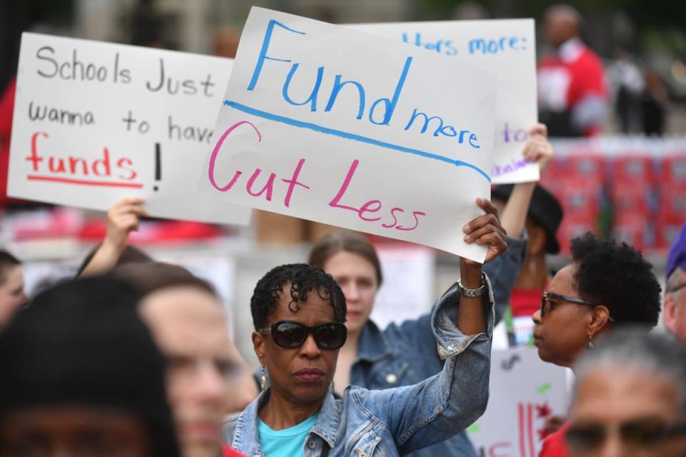 Teachers, students and members of the Teachers Union gather and rally against budget cuts and underfunding of District of Columbia Public Schools at Freedom Plaza in Washington, D.C. on April 25, 2019. (Photo by Marvin Joseph/The Washington Post via Getty Images)