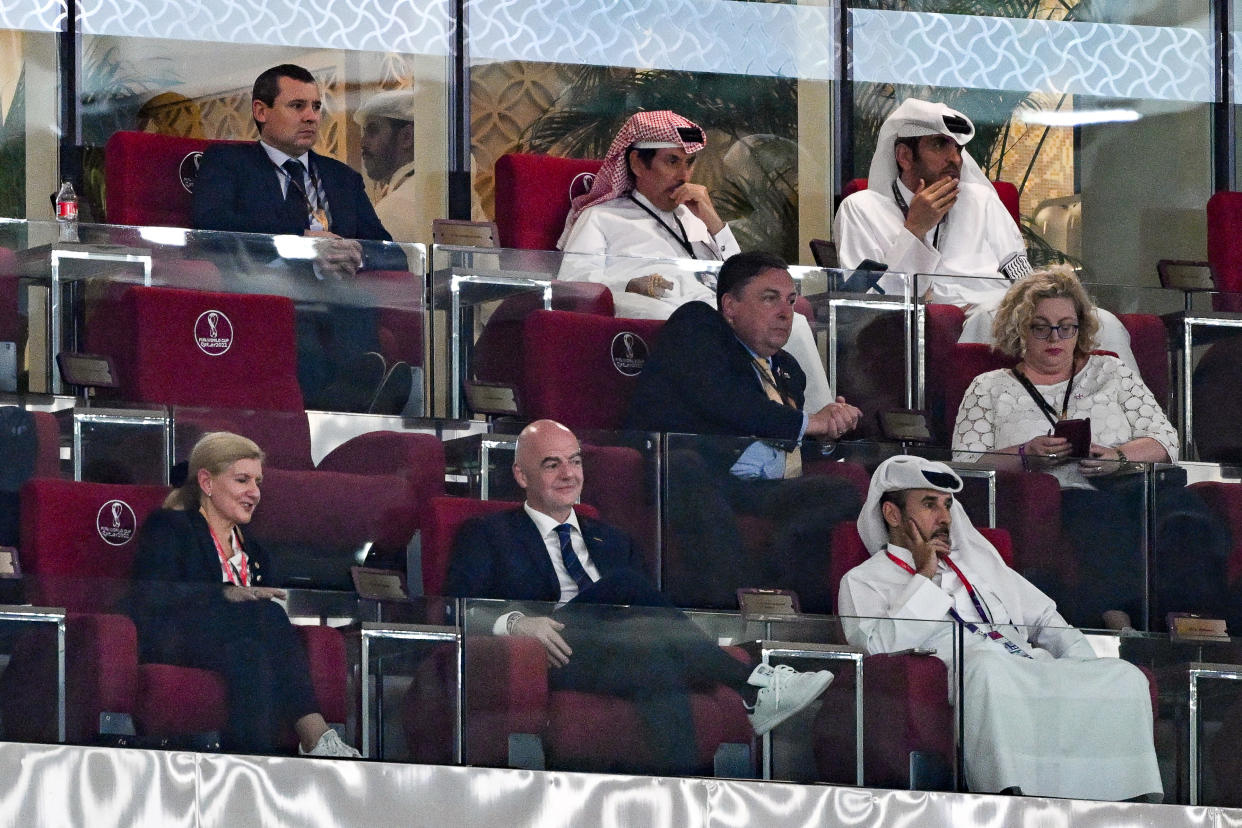 FIFA President Gianni Infantino (C) attends the Qatar 2022 World Cup Group B football match between Wales and England at the Ahmad Bin Ali Stadium in Al-Rayyan, west of Doha on November 29, 2022. (Photo by Ina Fassbender / AFP) (Photo by INA FASSBENDER/AFP via Getty Images)