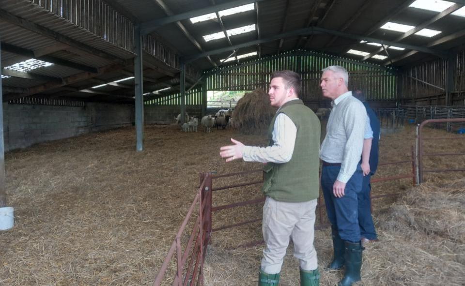 Dorset Echo: Farmer Harry Coutts discussing his family farm with MP Steve Barclay
