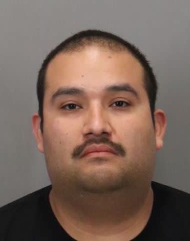 <p>San Jose Police Department</p> Louie Juarez Jr. in booking photograph, March 15, 2023.