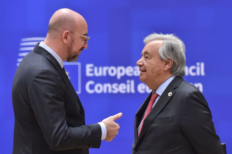 United Nations Secretary General Antonio Guterres and President of the European Council Charles Michel, arrive to attend a round table meeting at the EU summit in Brussels. -/European Council/dpa