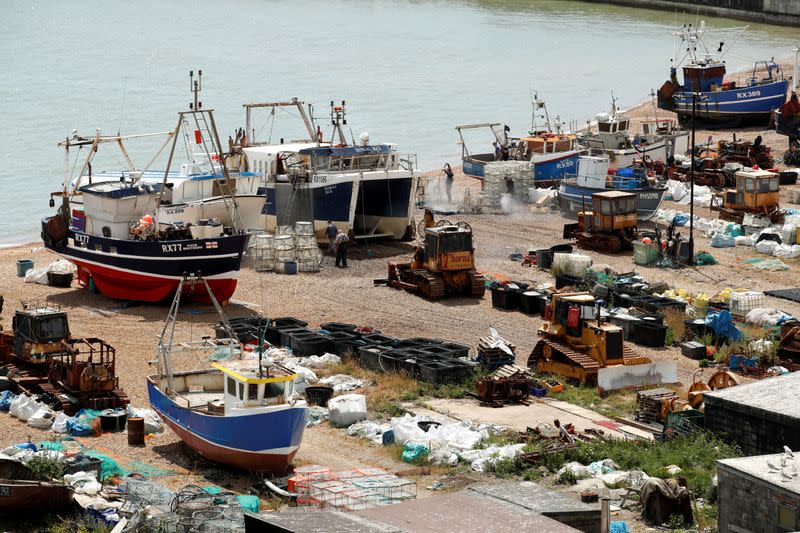FILE PHOTO: Fishing boats and fisherman in Hastings