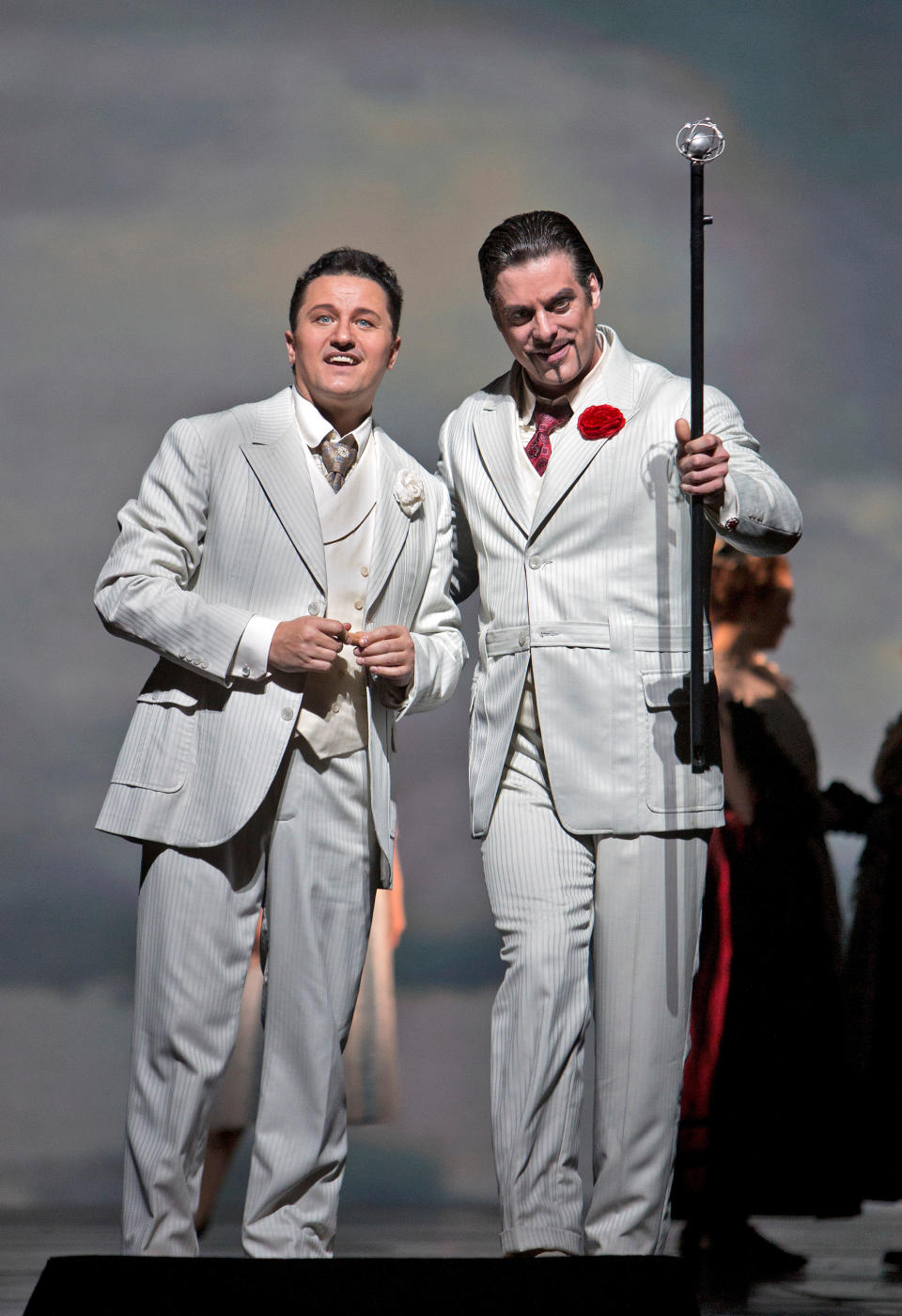 In this March 18, 2013 photo provided by the Metropolitan Opera, Piotr Beczala is Faust and John Relyea is Méphistophélès during a dress rehearsal of “Faust” at the Metropolitan Opera in New York. (AP Photo/Metropolitan Opera, Cory Weaver)