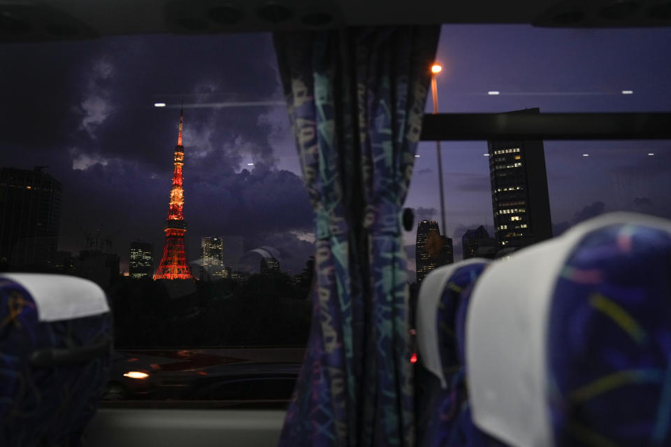 The Tokyo Tower is seen through a bus window ahead of the delayed 2020 Summer Olympics on Thursday, July 15, 2021, in Tokyo. (AP Photo/Jae C. Hong)