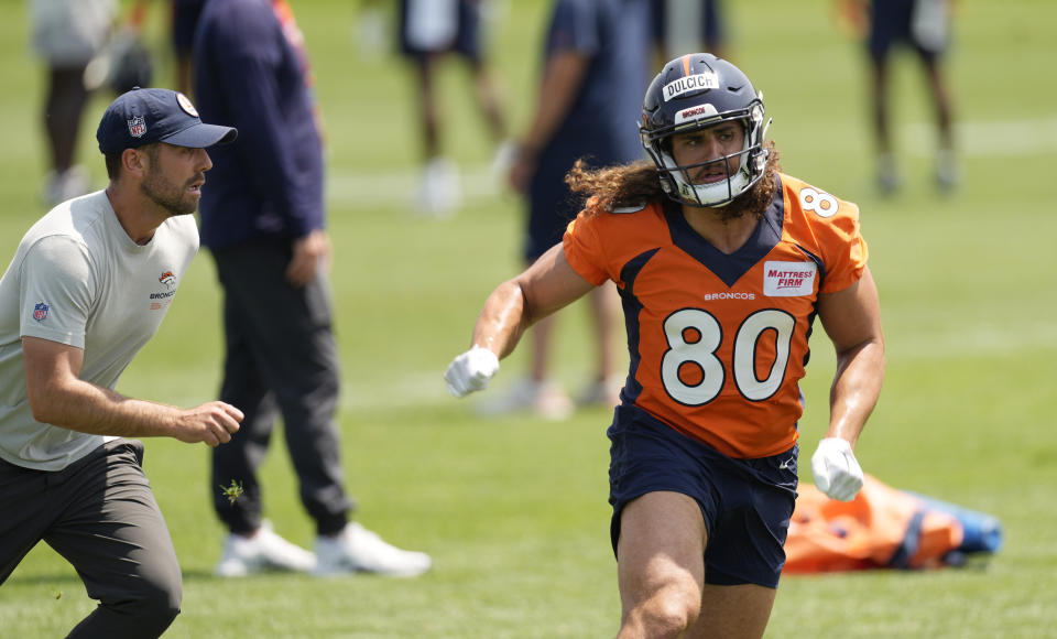 Denver Broncos tight end Greg Dulcich takes part in drills during a mandatory NFL football minicamp at the Broncos' headquarters Wednesday, June 14, 2023, in Centennial, Colo. (AP Photo/David Zalubowski)