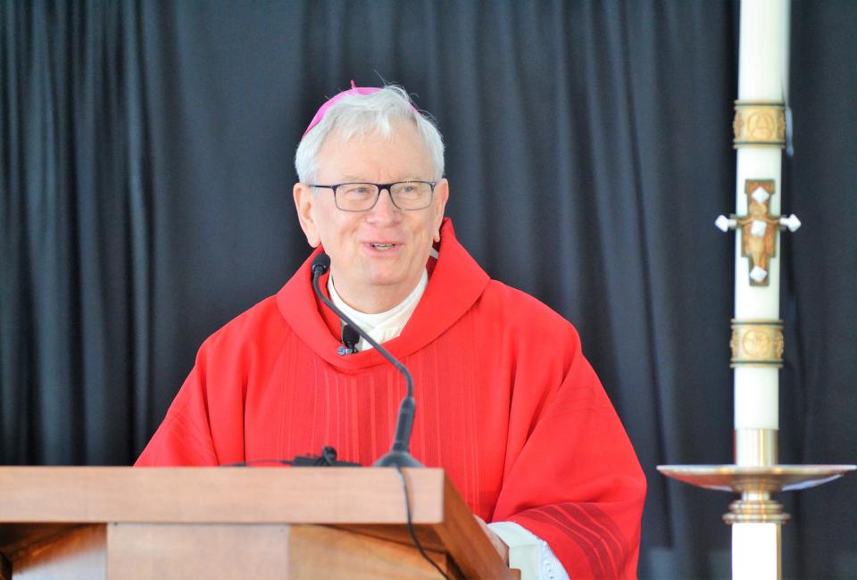 Bishop David Ricken gives the homily during an outdoor Mass in celebration of HSHS St. Clare Hospital's 100th anniversary in Oconto Falls on June 1.