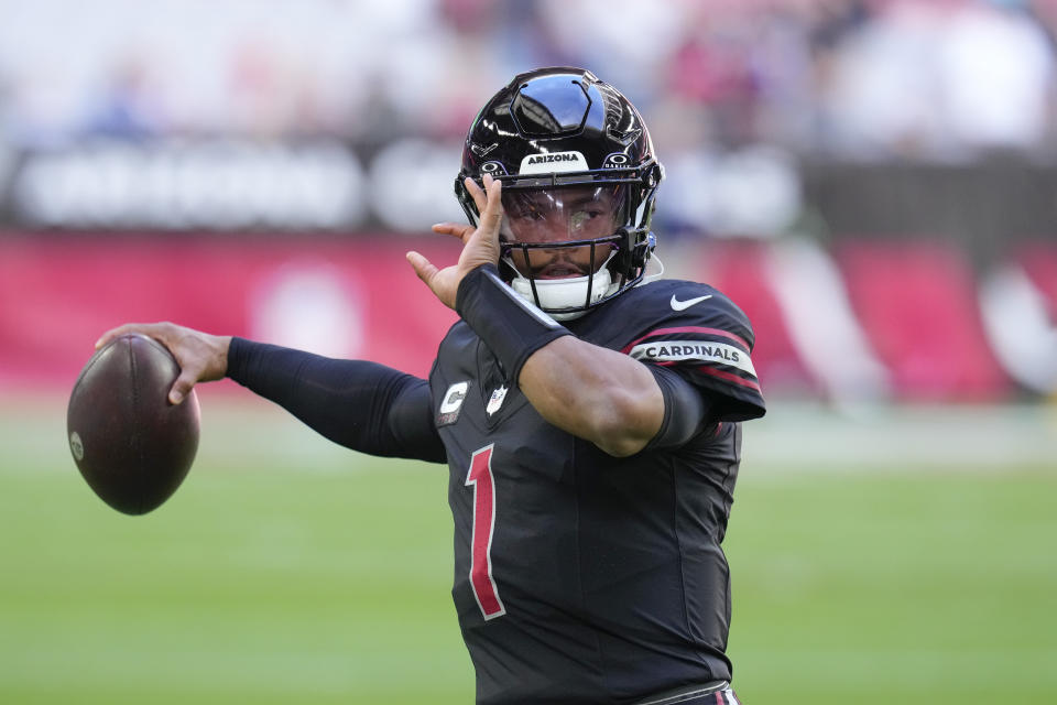 Arizona Cardinals quarterback Kyler Murray warms up before an NFL football game against the Los Angeles Rams, Sunday, Nov. 26, 2023, in Glendale, Ariz. (AP Photo/Ross D. Franklin)