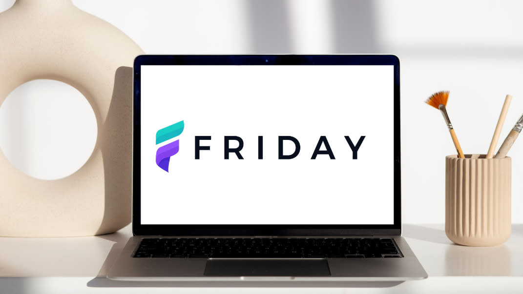  Friday website builder logo on an open laptop screen 