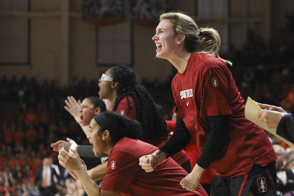 Stanford's Estella Moschkau (20) and the rest of the Stanford bench react to an official ruling during the second half of an NCAA college basketball game against Oregon State in Corvallis, Ore., Sunday, Jan. 19, 2020. (AP Photo/Amanda Loman)