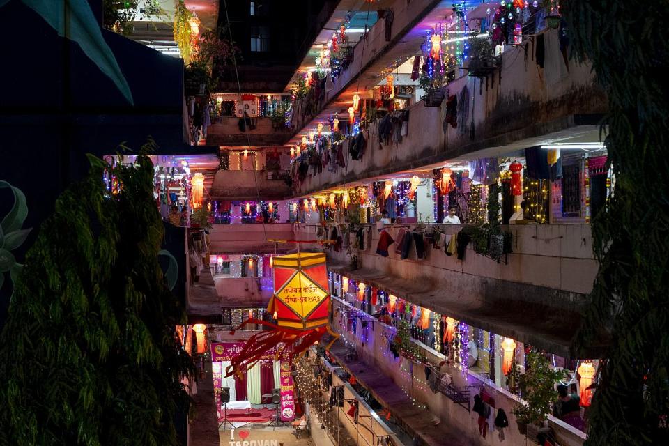 A residential building is decorated with lanterns and lights during Diwali, the festival of lights in Mumbai, India, Sunday, Nov. 12, 2023.