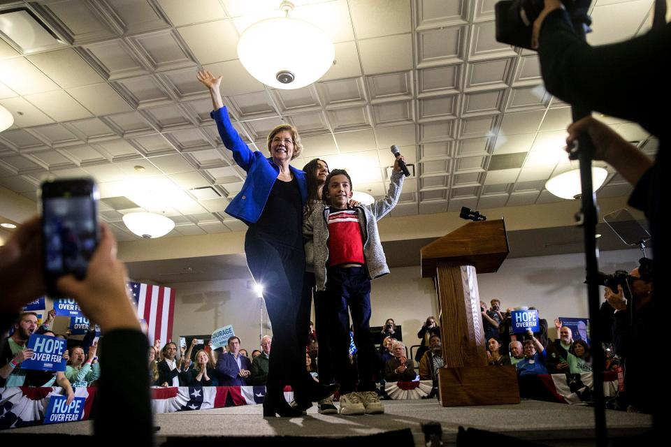 U.S. Elizabeth Warren, D-Mass., accompanied by her grandchildren take the stage to address the crowd at her caucus night party on Monday, Feb. 3, 2020, at Forte in downtown Des Moines, Iowa. At the time of her speech results of the caucuses were still unknown.