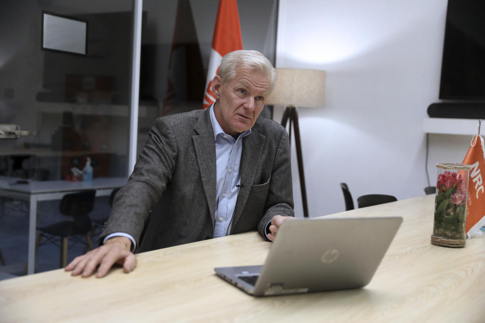 Secretary General of the Norwegian Refugee Council, NRC, Jan Egeland speaks in an interview with The Associated Press in Tehran, Iran, Wednesday, Nov. 10, 2021. Thousands of Afghan refugees are fleeing the Taliban into neighboring Iran every day and the trend could become a crisis for Europe, Egeland said Wednesday. (AP Photo/Vahid Salemi)