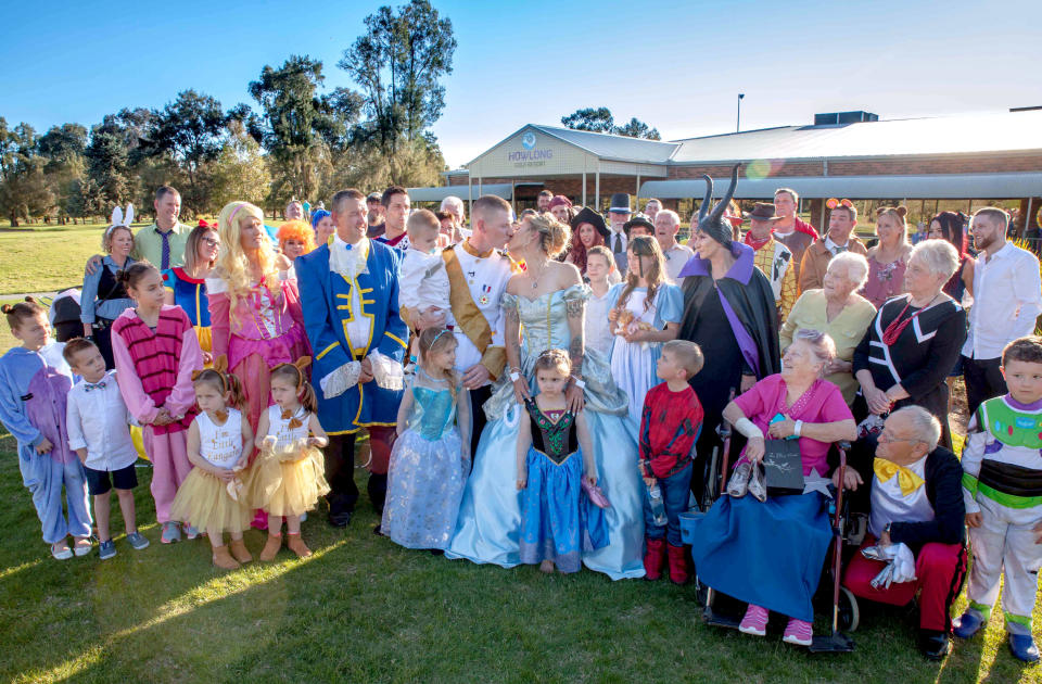 The couple asked guests to dress in Disney-themed outfits on their big day [Photo: Caters]