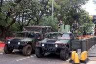 Paraguayan soldiers patrol the Friendship Bridge that connects Ciudad del Este in Paraguay with Foz do Iguacu in Brazil after the border closure due to the coronavirus disease (COVID-19) outbreak in Ciudad del Este, Paraguay