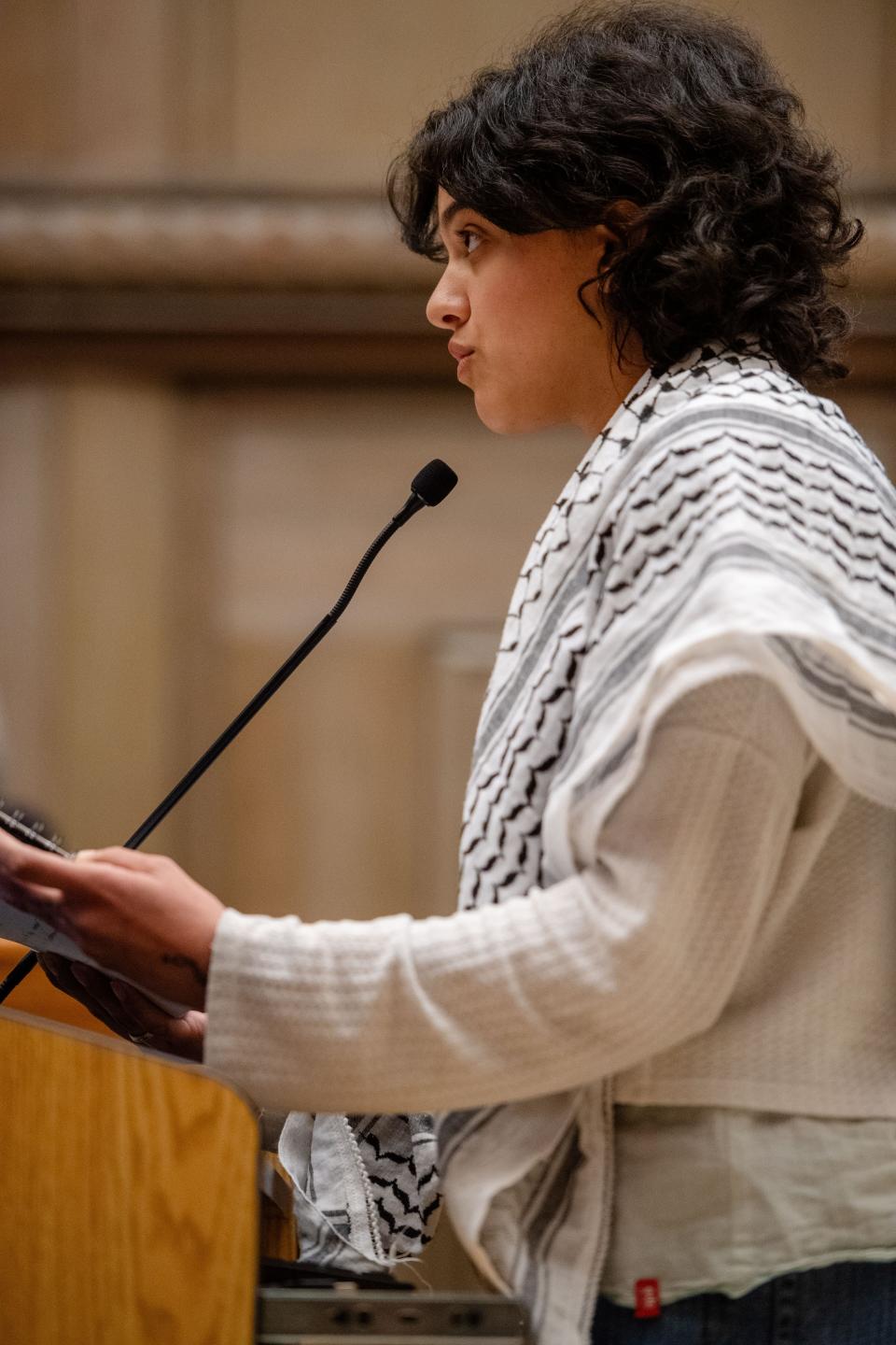 Nour Lotfy Abdelfatah, 22, asks for a cease fire resolution during public comment at the Asheville City Council meeting, March 12, 2024. Lofty was born and raised in Egypt, sharing a border with Gaza. She grew up during the Arab Spring and witnessed a revolution.