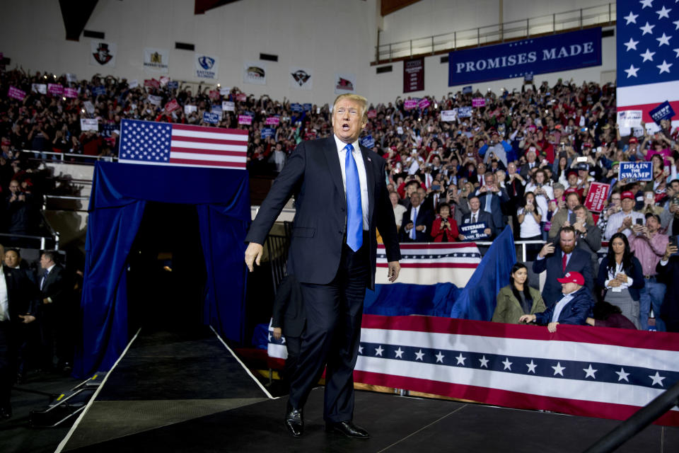 President Donald Trump takes the stage at a rally at Alumni Coliseum in Richmond, Ky., Saturday, Oct. 13, 2018. (AP Photo/Andrew Harnik)