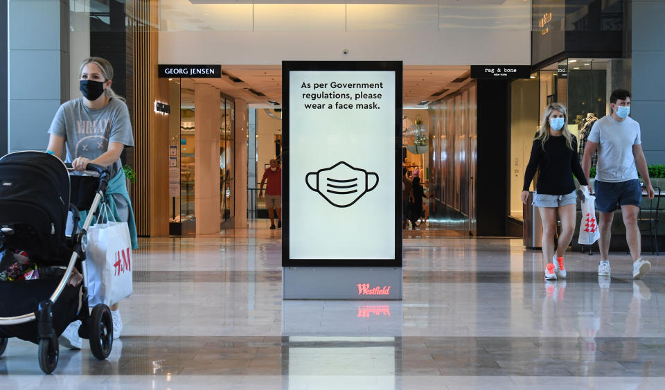 Digital signs encourage customers to wear face masks at Westfield Bondi Junction in January