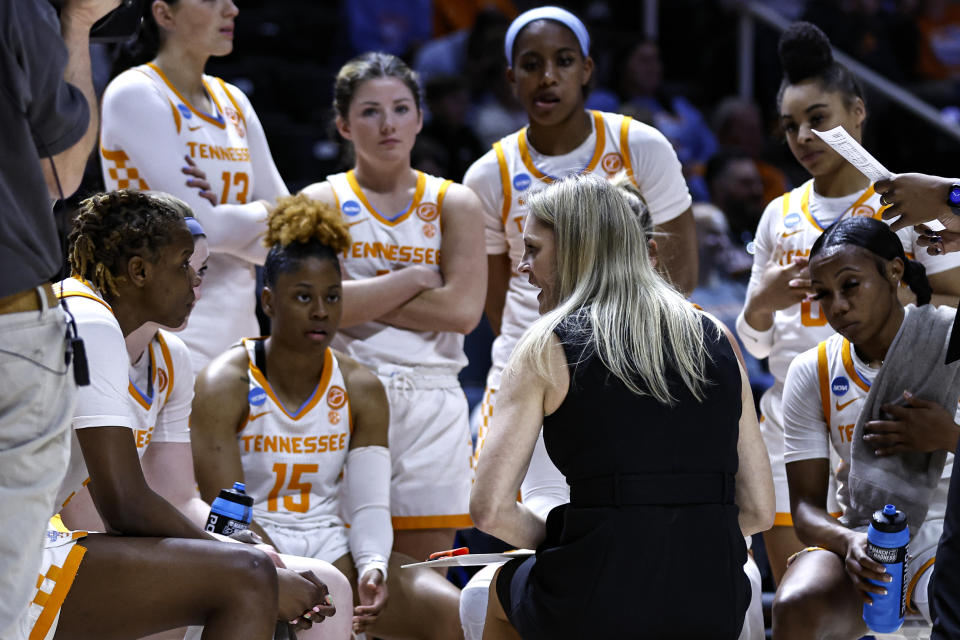 Tennessee head coach Kellie Harper talks with her players during a timeout in the second half of a second-round college basketball game against Toledo in the NCAA Tournament, Monday, March 20, 2023, in Knoxville, Tenn. (AP Photo/Wade Payne)