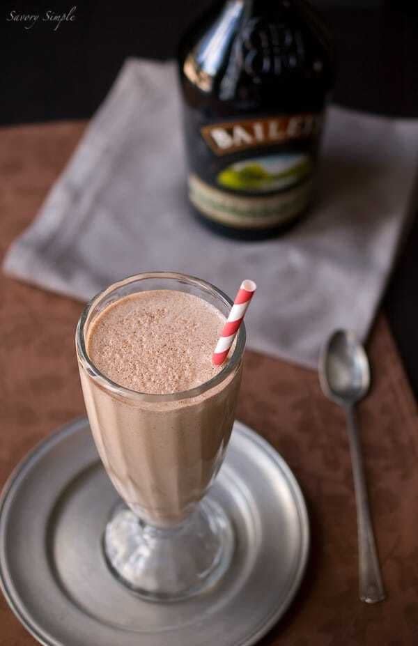 nutella irish cream milkshake with red and white straw