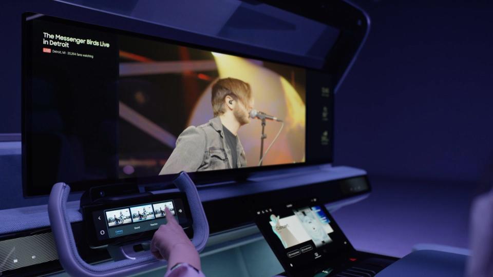 A widescreen display rises from the instrument panel in Harman.s 2021 ExP Demo Car.